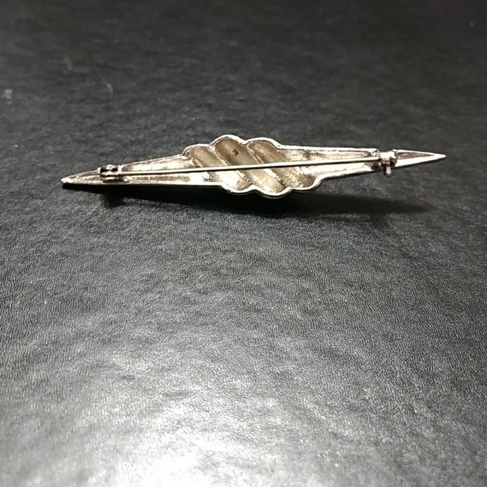 Silver tone long pointy pin brooch